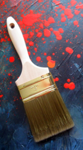 paintbrush-on-spattered-background-1439539-m